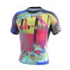 A Manto neon abstract rashguard displayed on a clean background.