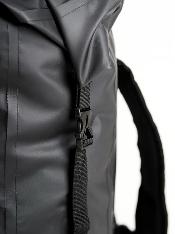 Manto New York Roll Top Backpack Black 7 Manto New York Roll Top Backpack in a urban setting