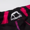 A pair of Manto Rave Shorts hanging on a white background.