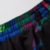 Manto Rave Fight Shorts on white background