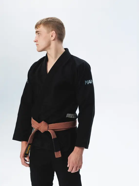 Professional martial artist wearing Manto Rise 2.0 BJJ Gi