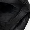 Manto Society Convertible Backpack on a neutral background