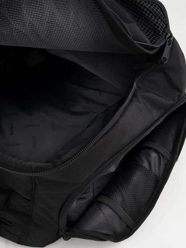 Manto Society Convertible Backpack on a neutral background