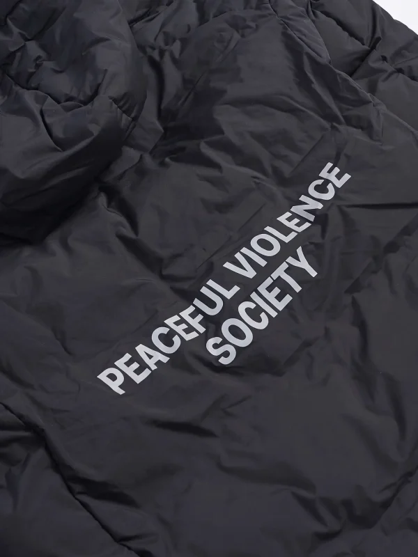 Man wearing Manto Society Puffer Jacket in an urban setting