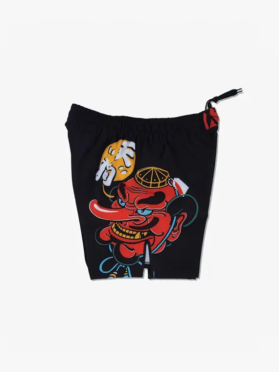 Manto Tengu Red and Black Fight Shorts Man wearing Manto Tengu Fight Shorts