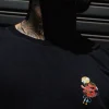 Manto Tengu t-shirt on a plain background
