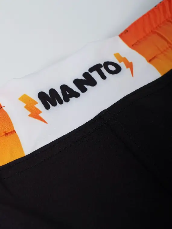 Manto Tigers Fight Shorts Black 3 A pair of Manto Tigers Fight Shorts on a neutral background