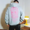 Manto X Ktof Balaclava Oversize Hoodie Heather Grey Pink 4 Man wearing a Manto x KTOF Balaclava Oversize Hoodie