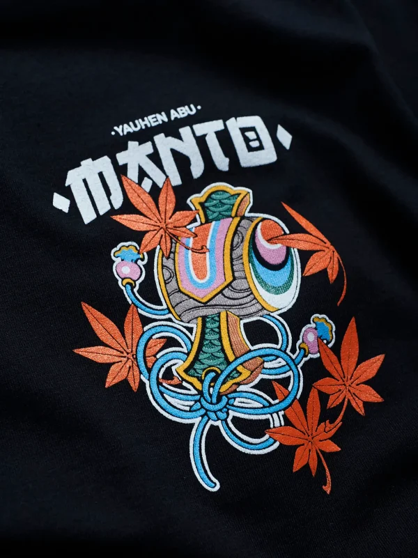 Manto x Yauhen Abu Fudo T-Shirt on a blank background