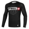 Pitbull Hilltop Sports Longsleeve Rash Guard. Man wearing a 'Pitbull Hilltop Sports Longsleeve Rash Guard' in a casual setting.