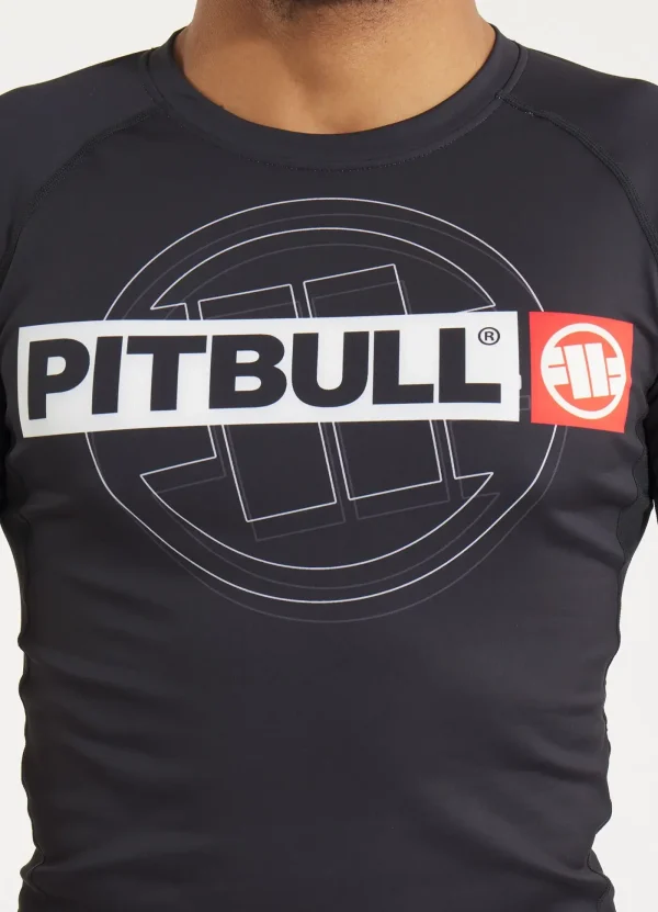 Pitbull Hilltop 2 Rash Guard Black Grey Camo 12 Man wearing the Pitbull Hilltop 2 Rash Guard, a high-quality sports attire perfect for training.