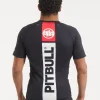 Pitbull Hilltop 2 Rash Guard Black Grey Camo 14 Man wearing a 'Pitbull Hilltop 2 Rash Guard' for extreme sport activities.