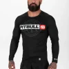 Pitbull Hilltop Sports Longsleeve Rash Guard Black 13 Man wearing Pitbull Hilltop Sports Longsleeve Rash Guard, in a dynamic athletic pose.