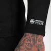 Pitbull Hilltop Sports Longsleeve Rash Guard Black 15 Athletic man wearing Pitbull Hilltop Sports Longsleeve Rash Guard during outdoor training