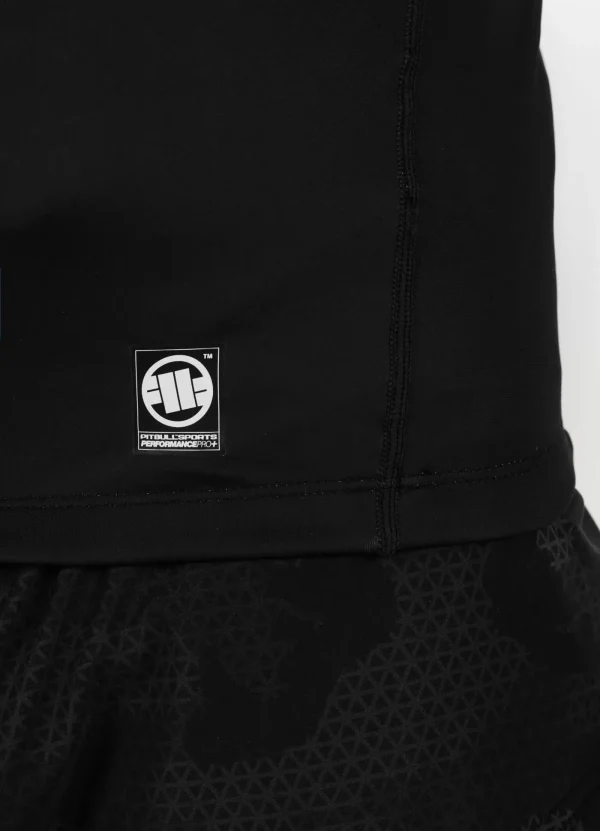 Pitbull Hilltop Sports Longsleeve Rash Guard Black 16 Man wearing the sleek and durable Pitbull Hilltop Sports Longsleeve Rash Guard, ideal for water sports and outdoor activities.