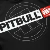 Pitbull Hilltop Sports Longsleeve Rash Guard Black 2 Man posing in a "Pitbull Hilltop Sports Longsleeve Rash Guard", perfect for outdoor sports.