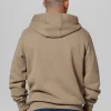 Pitbull Mens Sherwood Hoodie Beige 3 Man wearing a Pitbull Men's Sherwood Hoodie in a casual setting.