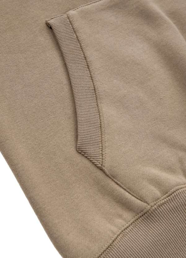 Pitbull Mens Sherwood Hoodie Beige 7 Man modeling Pitbull Men's Sherwood Hoodie in stylish setting.