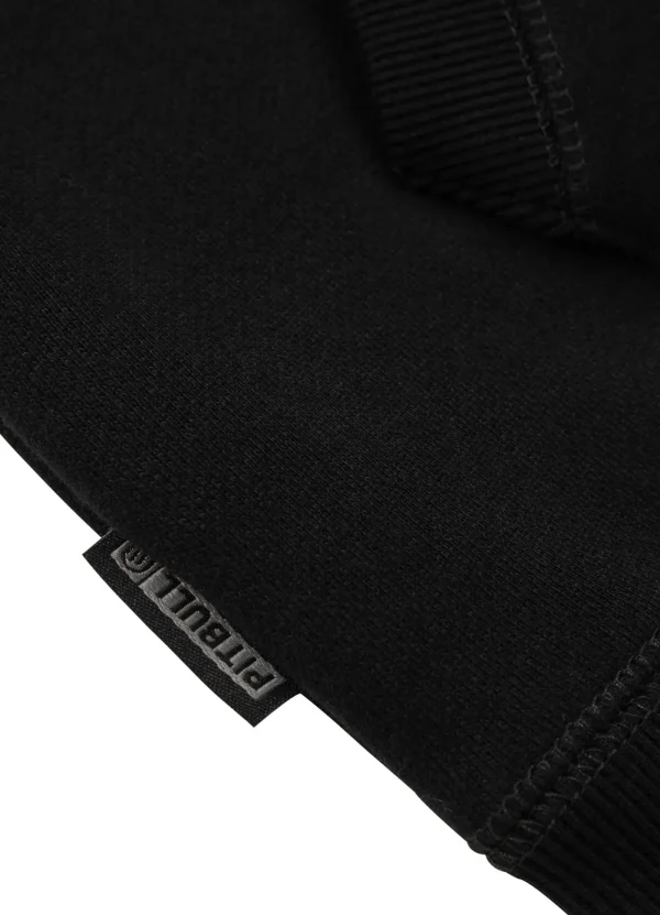 Pitbull Most Wanted Hoodie Black 7 A model wearing the Pitbull Most Wanted Hoodie in casual style.