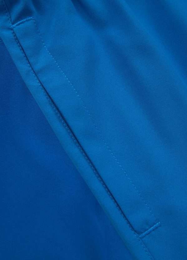 Pitbull Sports Shorts Performance Pro Plus Small Logo Ii Blue 8 Athlete wearing Pitbull Sports Shorts Performance Pro Plus Small Logo II