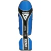 RDX Shin Guards Aura Plus T-17 in use during a match