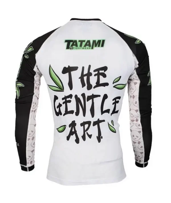 Tatami Fightwear Gentle Panda Rash Guard White Black 1 A Tatami Fightwear Gentle Panda Rash Guard in a navy blue color, displayed on a sleek, white background.
