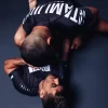 Athlete wearing Tatami Fightwear Impact Rashguard for martial arts training