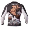 Man modeling the Tatami Fightwear Thinker Monkey Rash Guard.