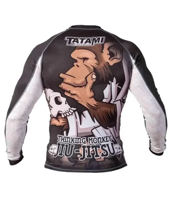 Man modeling the Tatami Fightwear Thinker Monkey Rash Guard.