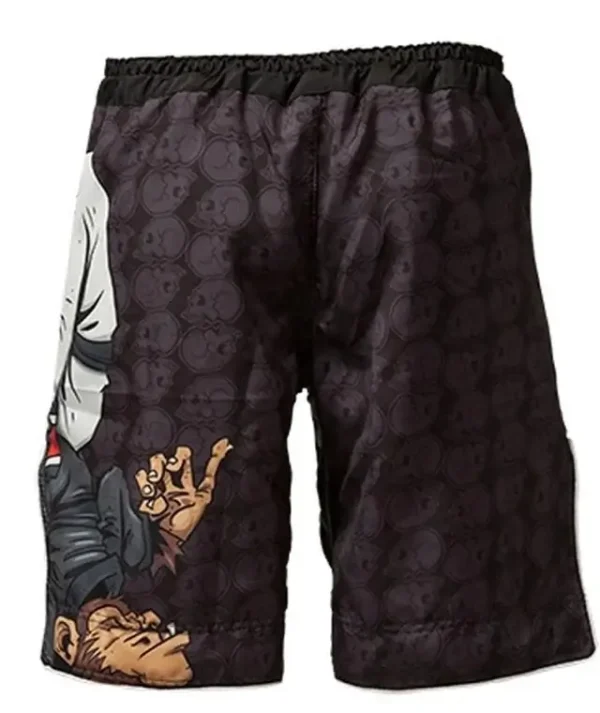 Man wearing Tatami Fightwear Thinker Monkey Shorts with martial arts training background.