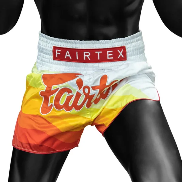 Fairtex BS1932 Spectrum Muay Thai Shorts - White/Orange in White/Orange — flat lay
