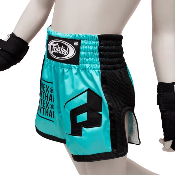 Fairtex Kids Muay Thai Shorts BSK2107 - Turqouise/Black in Turqouise/Black — front view
