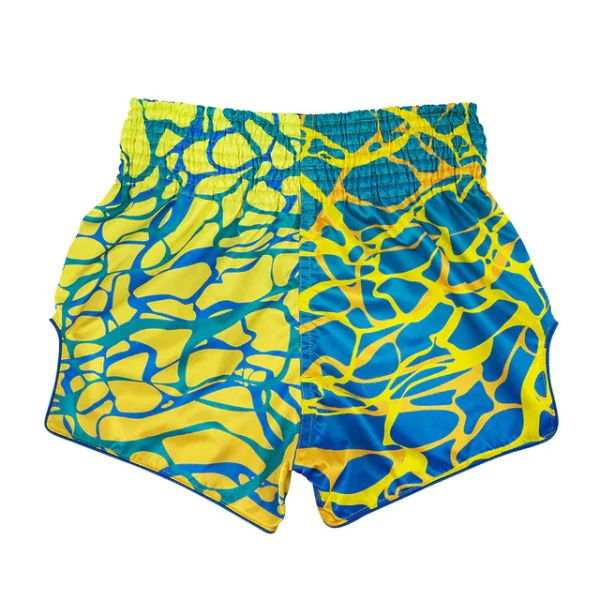 Fairtex Magma Muay Thai Shorts - Yellow/Blue in Yellow/Blue — flat lay