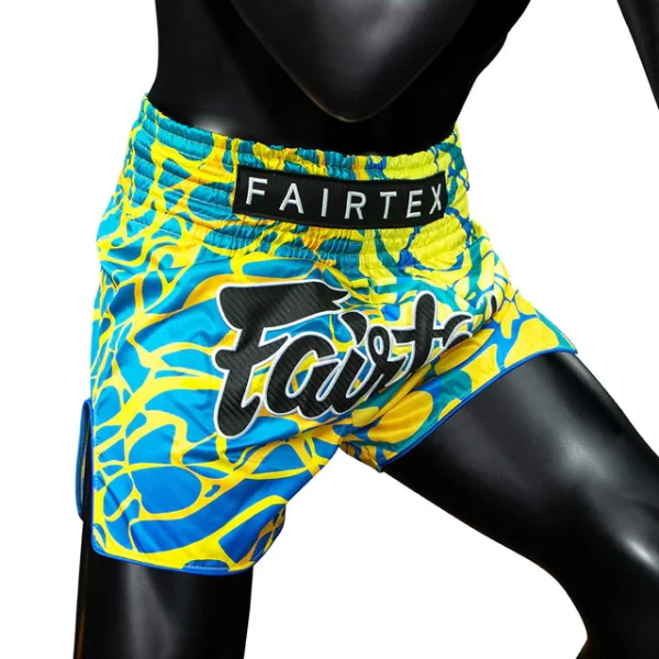 Fairtex Magma Muay Thai Shorts - Yellow/Blue in Yellow/Blue — sleeve detail