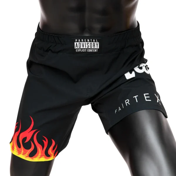 Fairtex MMA Board Shorts Burn AB12 - Black in Black — flat lay