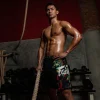 Fairtex MMA Board Shorts Wild AB13 - Black in Black — front angle