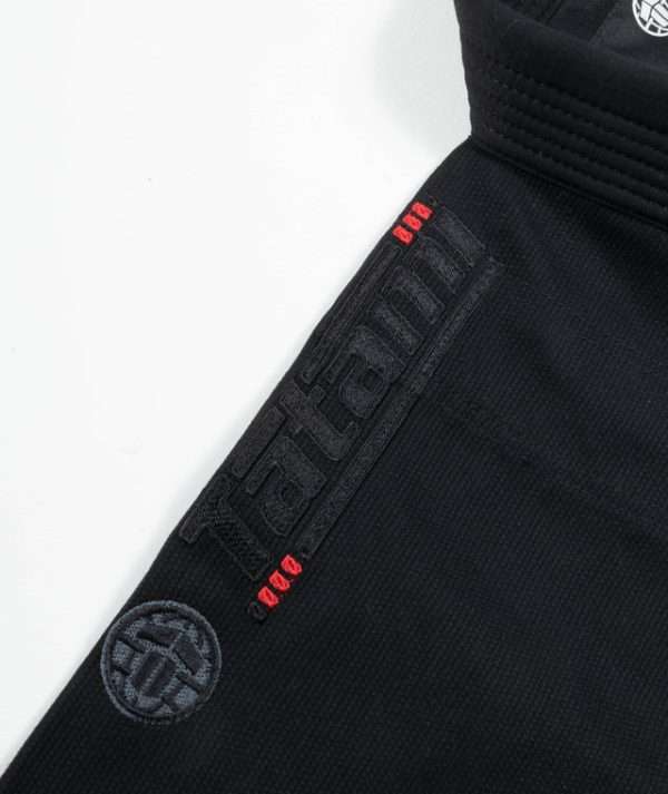 Tatami Kids Elements Superlite Bjj Gi Black 5 Tatami Kids Elements Superlite BJJ Gi - Black in Black — three‑quarter angle