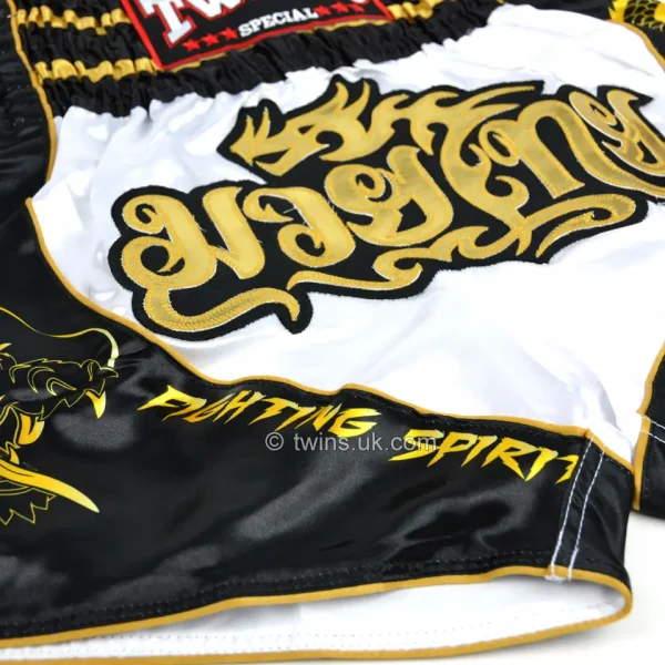 Twins Special Dragon Muay Thai Shorts Tbs49 Dr Black White Gold 3 Twins Special Dragon Muay Thai Shorts TBS49-DR - Black/White/Gold in Black/White/Gold — detail shot