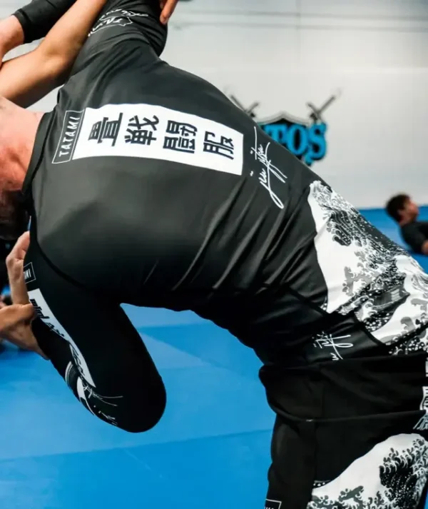 Tatami rash guard action shot