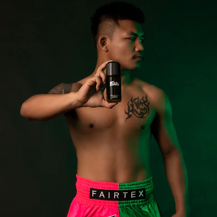 bl6-fairtex-liniment-oil-compound-peppermint-scent-100ml-2 ONE FC fighter Rodtang showing the Fairtex brand Thai oils, other recipies and creams are available