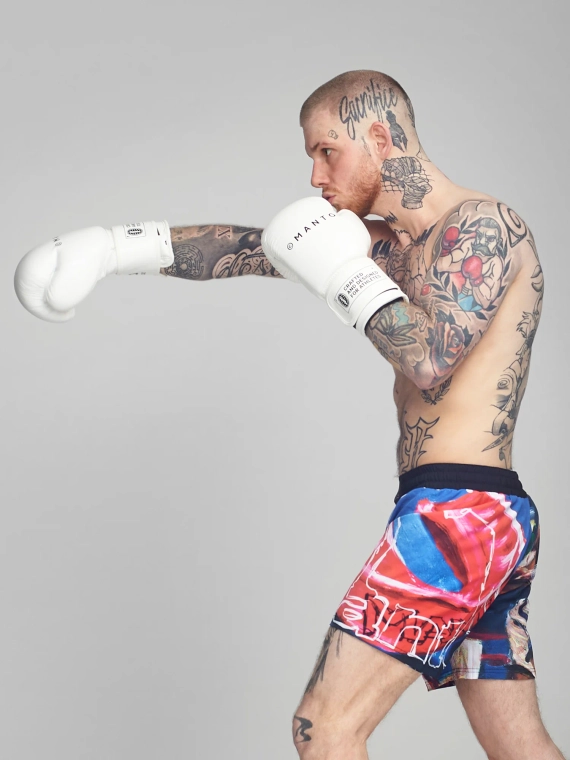 Man wearing Manto boxing gloves