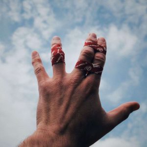 finger tape A hand wrapped up in scramble finger tape