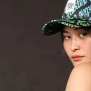 An image showing Fairtex sponsored Muay Thai champion Stamp Fairtex in a cap, checkout our full range of hats