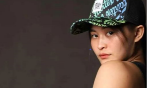 An image showing Fairtex sponsored Muay Thai champion Stamp Fairtex in a cap, checkout our full range of hats
