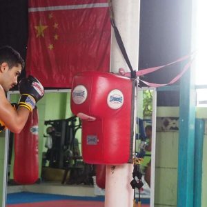 Fighter practices his technique on the Sandee uppercut wall bag