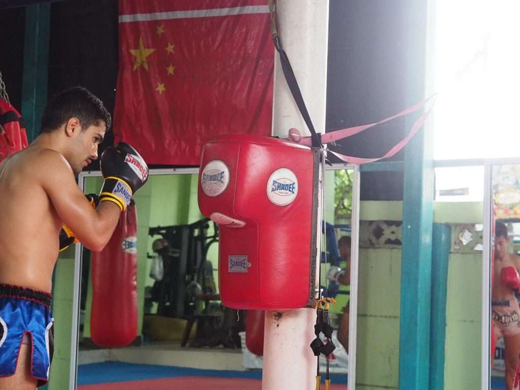 Fighter practices his technique on the Sandee uppercut wall bag