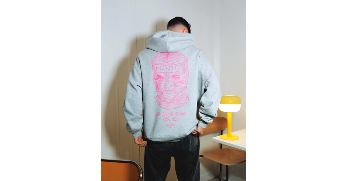 Man wearing casual Manto BJJ Hoodies, part of the KTOF collection