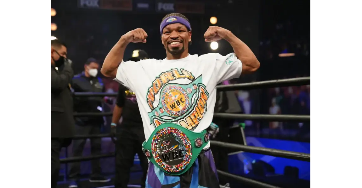 World Boxing Chamipion wearing one of the WBC Boxing T-Shirts in the Ring, along with the WBC Belt after a big win