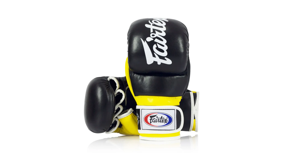 Fairtex FGV18 MMA gloves in black and yellow for grappling and striking.