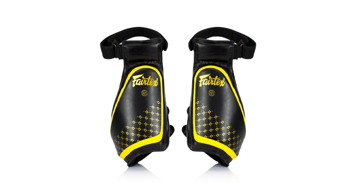 Product image of the Fairtex TP3 Leg Pads Black and Yellow